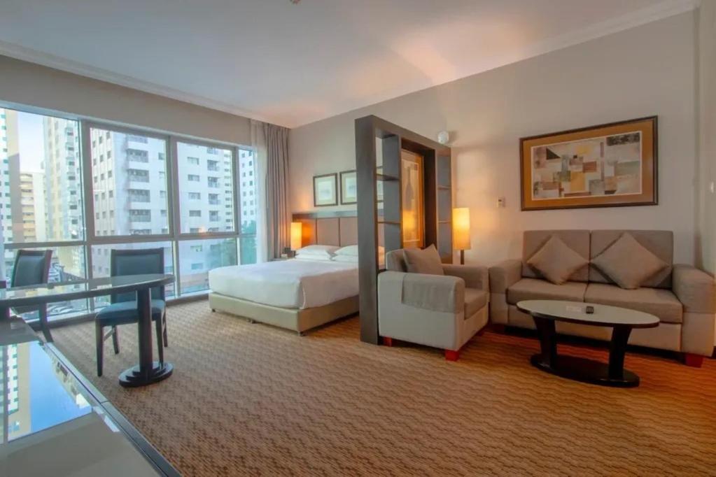 Al Manzel Hotel Apartments Abu Dhabi Exterior photo